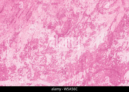 Saturated rose-color painted wall, hot pink background. Grunge surface of granite slab. Abstract red pattern with marbled effect. Watercolor in modern Stock Photo