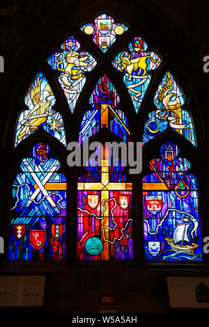 Modern stained glass window depicting town trades - Church of the Holy Rude, old town of Stirling, Scotland, UK Stock Photo