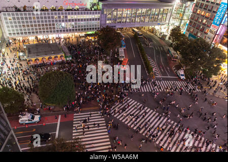 Most busiest crossrad in the world close to famous Shibuya train station in Tokyos city center captured at night, Japan October 2018 Stock Photo