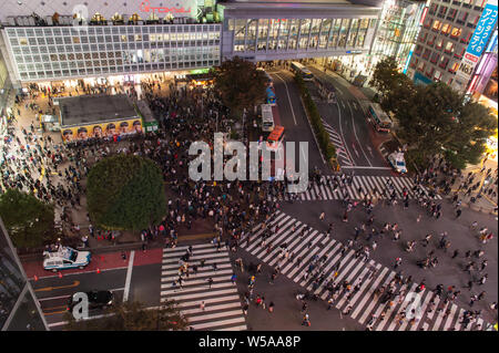 Most busiest crossrad in the world close to famous Shibuya train station in Tokyos city center captured at night, Japan October 2018 Stock Photo