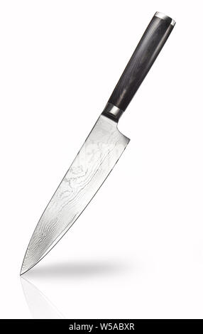 Professional steel kitchen knife with black handle and reflection isolated on white background. Clipping path included Stock Photo