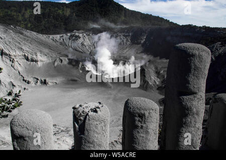 (190727) -- WEST JAVA, July 27, 2019 (Xinhua) -- Smoke spewed from crater of Mount Tangkuban Parahu is seen after eruption at Subang, West Java, Indonesia, July 27, 2019. Popular destination of Tangkuban Parahu volcano in Indonesia's West Java province erupted on Friday afternoon, spewing volcanic ash 200 meters into the air. (Photo by Syarif/Xinhua) Stock Photo