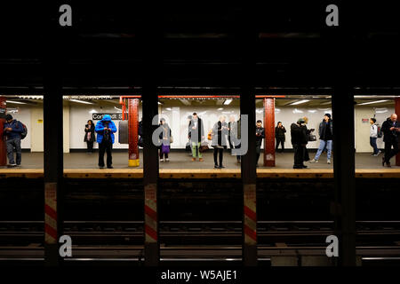 Passengers of the New York City Subway waiting for the train at the station 'Cortlandt Street'. Manhatten, New York City, New York, United States Stock Photo