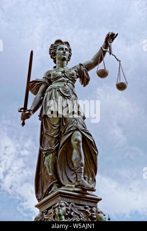 Lady Justice fountain statue at Römerberg in the old town of Frankfurt am Main, Hesse, Germany. Stock Photo