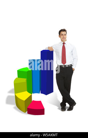 Businessman standing with bar chart Stock Photo