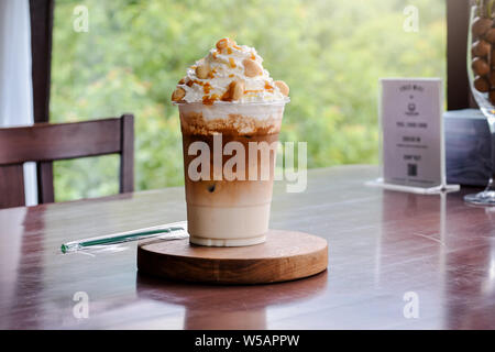 Cold coffee -Iced Caramel Macchiato Layered espresso drink, vanilla syrup, cold creamy milk espresso Stock Photo