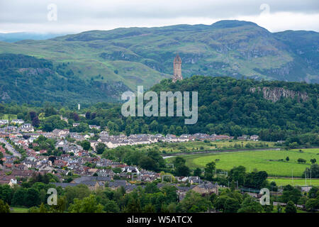 Distant view of the National Wallace Monument on Abbey Craig and the Ochil Hills beyond viewed from the battlements of Stirling Castle, Scotland, UK Stock Photo