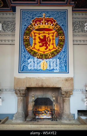 Restored fireplace and tapestry in the Kings Inner Chamber within the Royal Palace - Stirling Castle, Scotland, UK Stock Photo