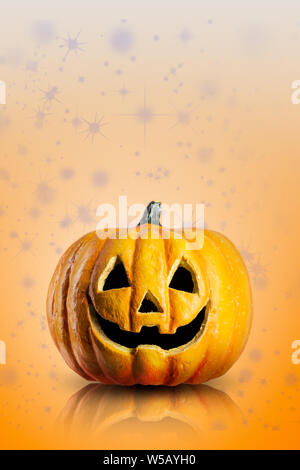 Halloween Pumpkin on orange background. Copy space for text. Jack o lantern Stock Photo