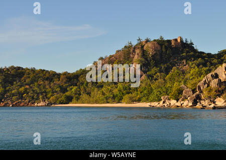 View to the rocky coastline and beach from the sea, Horseshoe Bay, Magnetic Island, Queensland, Australia Stock Photo
