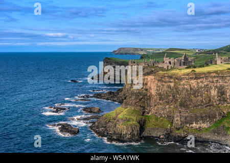 Dunluce Castle located on the edge of a basalt outcropping, Count Antrim, Northern Ireland Stock Photo