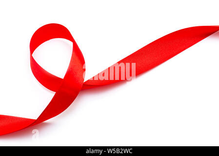 Red curly Ribbon Tape Band top View isolated on white Background Stock Photo
