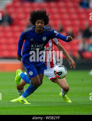 Stoke on trent, Staffordshire, UK. 27th July, 2019. 27th July 2019, Bet365 Stadium, Stoke, North Staffordshire, England; Stoke City versus Leicester City; Hamza Choudhury of Leicester City with his eye on the ball Credit: Action Plus Sports Images/Alamy Live News Stock Photo