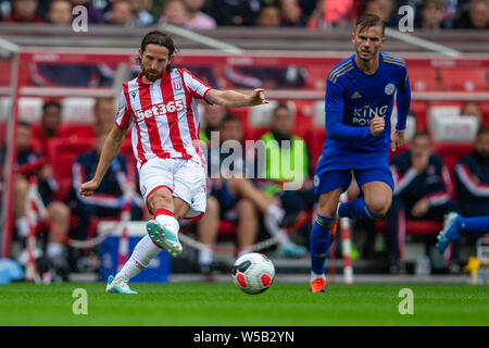 Stoke on trent, Staffordshire, UK. 27th July, 2019. 27th July 2019, Bet365 Stadium, Stoke, North Staffordshire, England; Stoke City versus Leicester City; Joe Allen of Stoke City crosses the ball Credit: Action Plus Sports Images/Alamy Live News Stock Photo
