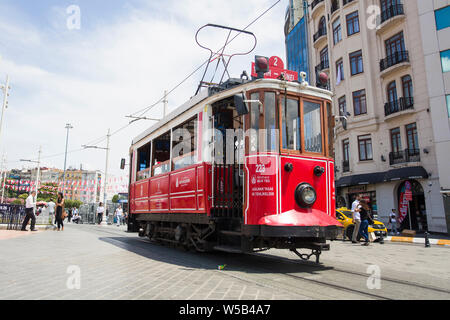 ISTANBUL, TURKEY - JUNE 15, 2019: Unidentified people by Istanbul nostalgic tramways in Istanbul, Turkey. In Istanbul there are are two tramlines with Stock Photo