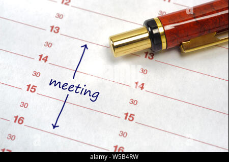 business meeting printed in calendar in office Stock Photo