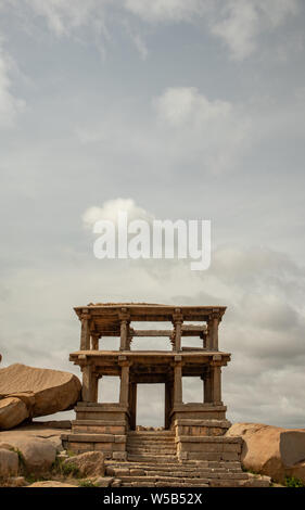 two-storeyed mandapa or double-storeyed gateway in the south west of the Vitthala temple, Hampi, India Stock Photo