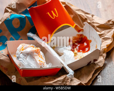 Close up of  Discarded McDonald's Take Away Food Packaging,  McDonald's is a fast food restaurant chain founded in 1940. Stock Photo