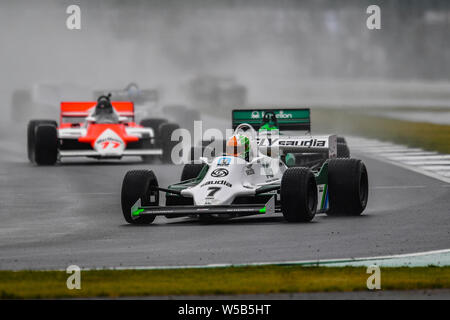 TOWCESTER, United Kingdom. 27th July, 2019. Mike Cantillon (Williams FW07C) during Sir Jackie Stewart Trophy for FIA Masters Historic Formula One of Day Two of Silverstone Classic Moto Racing at Silverstone Circuit on Saturday, July 27, 2019 in TOWCESTER, ENGLAND. Credit: Taka G Wu/Alamy Live News Stock Photo