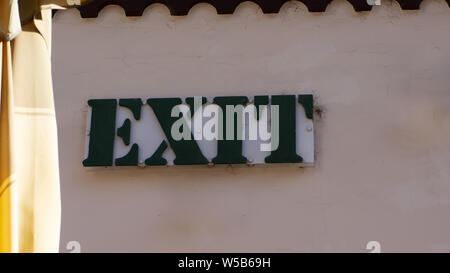 exit inscription on a house wall Stock Photo