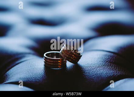 Wedding rings as a symbol of love and loyalty close up. Stock Photo