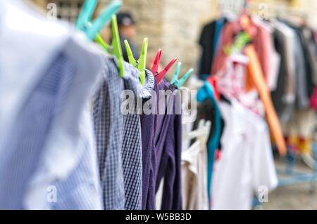 used cloting on a leash Stock Photo