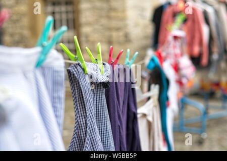 used cloting on a leash Stock Photo