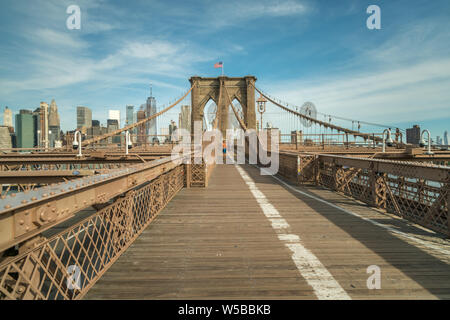 View of the Brooklyn Bridge Leading to Manhattan With Clear Skies Stock Photo