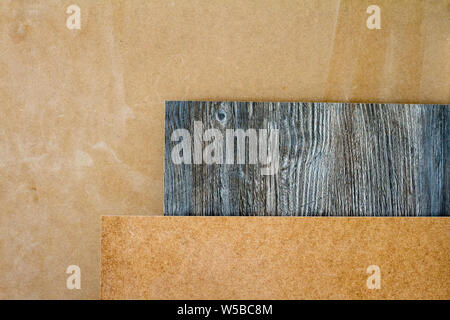 A wooden pillars and thick boards in the furniture workshop are ready to work joiner, selective focus Stock Photo