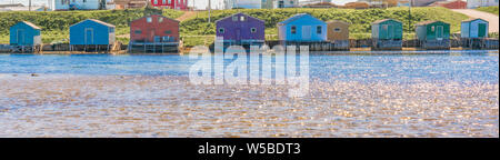 Colorful old fishing sheds along the ocean in Newfoundland, Canada Stock Photo