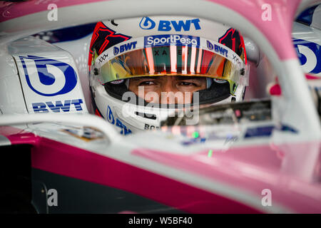 SportPesa Racing Point F1 Team’s Mexican driver Sergio Perez seen in his car during the third practice session of the German F1 Grand Prix. Stock Photo