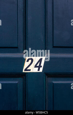 House Number 24 Sign On Door Photos and Images