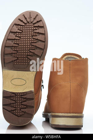 Casual brown tall shoes sole and back view isolated Stock Photo