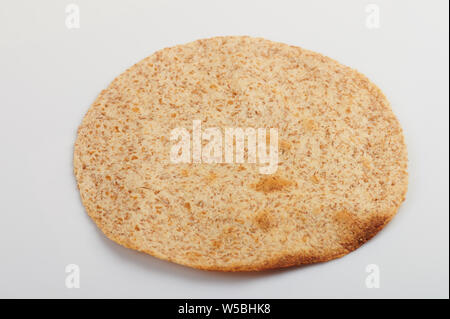 Angle view of one toasted tortilla isolated on white background Stock Photo