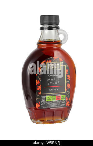 A bottle of Canadian Grade A Maple Syrup isolated on a white background Stock Photo