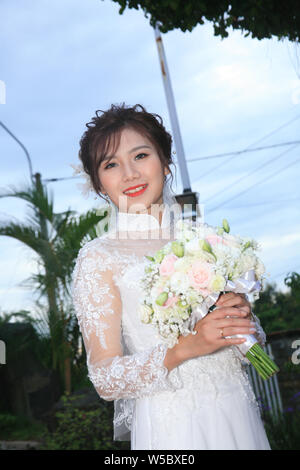 photo of beautiful bride wearing wedding dress Stock Photo