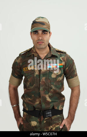 Indian army soldier standing in relaxed position Stock Photo - Alamy