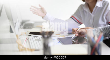 UI UX website development team sketching wireframe layout for responsive web content in studio Stock Photo