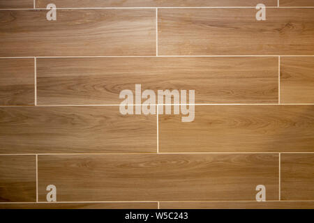 long square tan wood grained tile with white grout Stock Photo