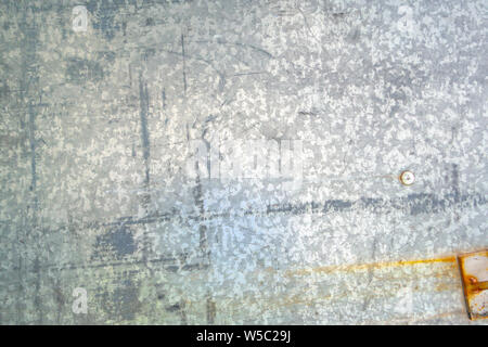 silver Patterned Galvanized Steel surface distressed and weathered Stock Photo