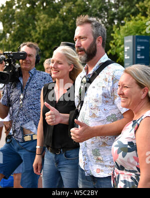 Ottawa, Canada - July 27, 2019:  Ottawa born comedian Tom Green at the rally he invited the public to join in an effort to prevent a proposed addition to the Chateau Laurier that many people feel is not appropriate for the iconic hotel.  He is with  Environment Minister Catherine McKenna, L, and MP Mona Fortier,. Stock Photo