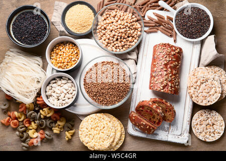 Various gluten free foods on wooden background. Top view Stock Photo