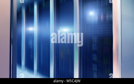 Rows of server racks. Modern interior of server room. Stock Photo