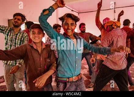 Nandgeon, India, Holi Festival, Feb 25, 2018 - Young men dance during Holi Festival in India Stock Photo