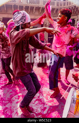 Nandgeon, India, Holi Festival, Feb 25, 2018 - Young men dance during Holi Festival in India Stock Photo