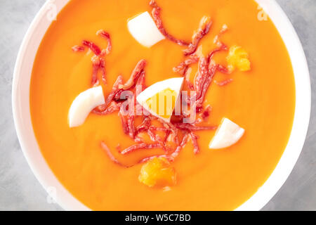 Salmorejo, Spanish cold tomato soup, close-up shot from the top Stock Photo