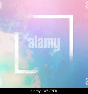 Pastel toned teal and pink sky with clouds and a frame, an abstract fantasy background with a place for text Stock Photo