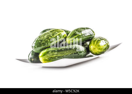 Fresh cucumbers isolated on white background - close-up. Stock Photo