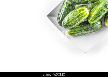 Fresh cucumbers isolated on white background - close-up. Stock Photo