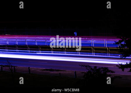 Long exposure photo of a street in Romania - Speed traffic, modern life theme Stock Photo
